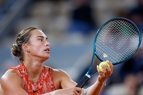 Aryna Sabalenka prepares to serve